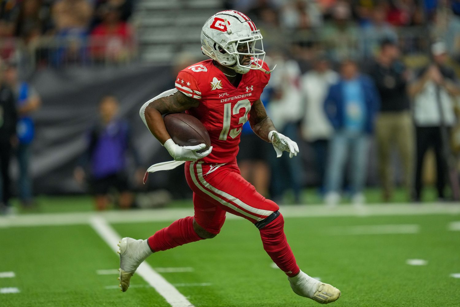 May 13, 2023; San Antonio, TX, USA; DC Defenders running back Pooka William Jr (13) returns a kick in the second half against the DC Defenders at the Alamodome. Mandatory Credit: Daniel Dunn-USA TODAY Sports  